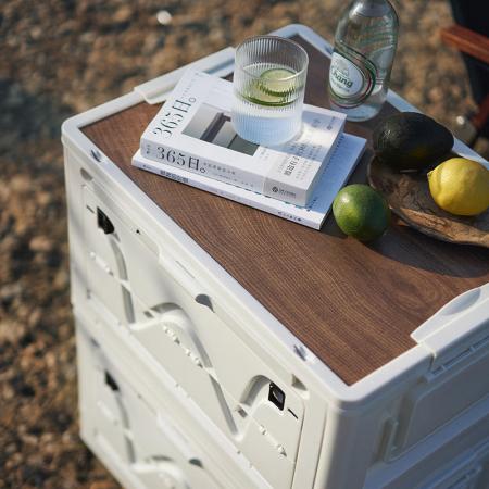 Zusammenklappbare Aufbewahrungsbox für den Außenbereich mit Holzdeckel 